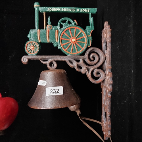 232 - A charming heavy, hand painted, cast iron Joseph Brewer & Sons traction engine wall bell with decora... 