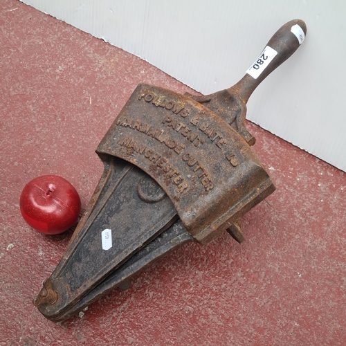 280 - An antique marmalade cutter, made by 'Follows & Bate' of Manchester.