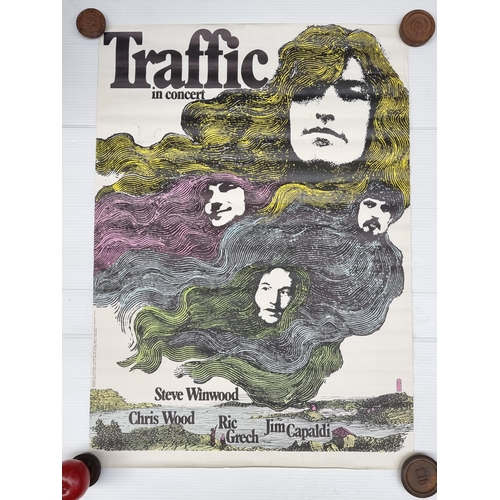 289 - Six 100% original music posters including a 1971 poster for 'Traffic in Concert'; a 1976 Peter Max a... 