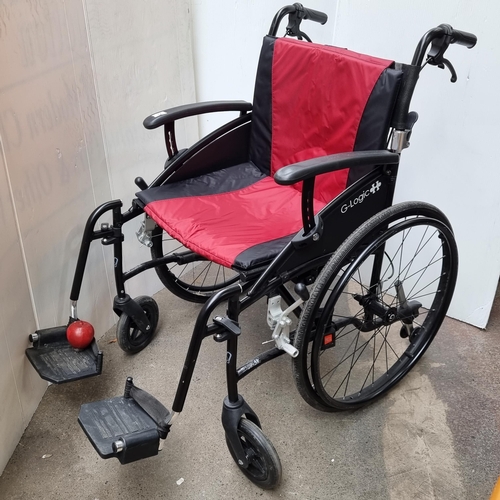 305 - An Excel G-Logic Self Propelled wheelchair, with swing-away and detachable footrests, removable padd... 