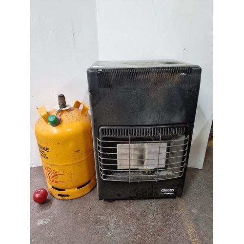 312 - A Timshel by Technigas portable gas heater. Along with a Calor 11.34KG butane gas cylinder.