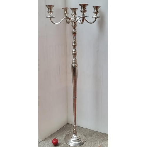 322 - Star lot : A very impressive heavy, silver toned four branch candelabra. Possibly of ecclesiastical ... 