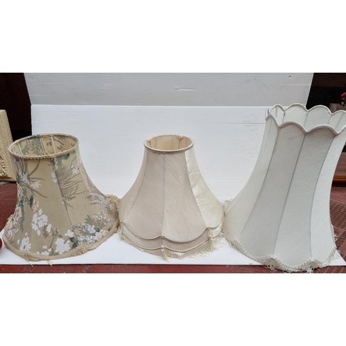 334 - A beautiful selection of three vintage lampshades in shades of cream including an elegant damask exa... 