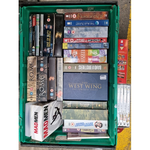 335 - A large crate containing approximately thirty DVD boxsets including television favourites such as 