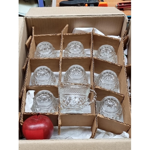 341 - A collection of eighteen punch bowl glasses with hobnail cut.