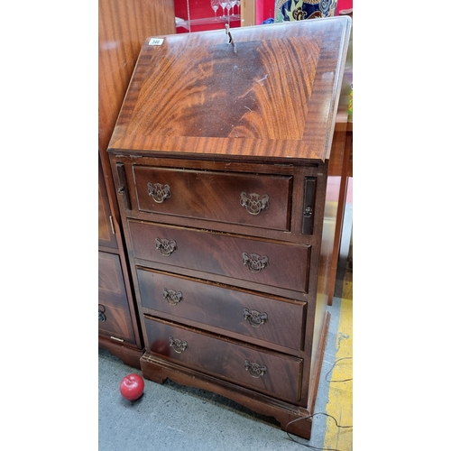 346 - A beautiful mid century writing desk, with four pull-out drawers, five pigeon holes, and golden leat... 