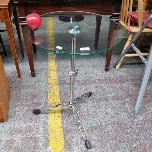 367 - An unusual glass occasional table, made with a drum stand base in a chrome finish. Super cool piece.