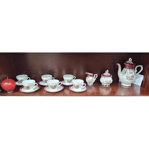 389 - A collection of fifteen mid century Japanese lustre ware tea/coffee set, with images of a courting c... 