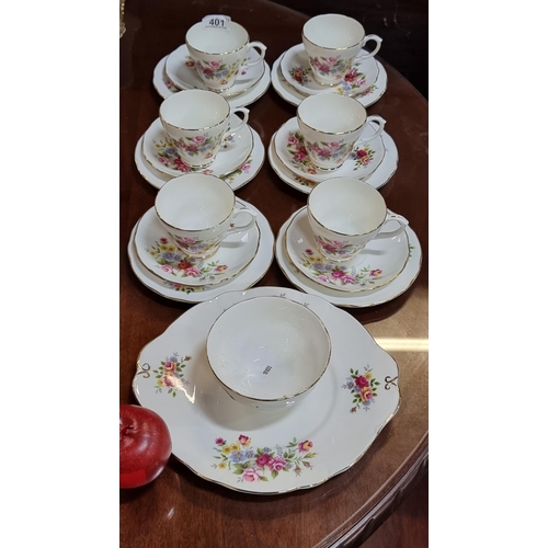 401 - A collection of twenty Dutchess bone china with a floral decoration.