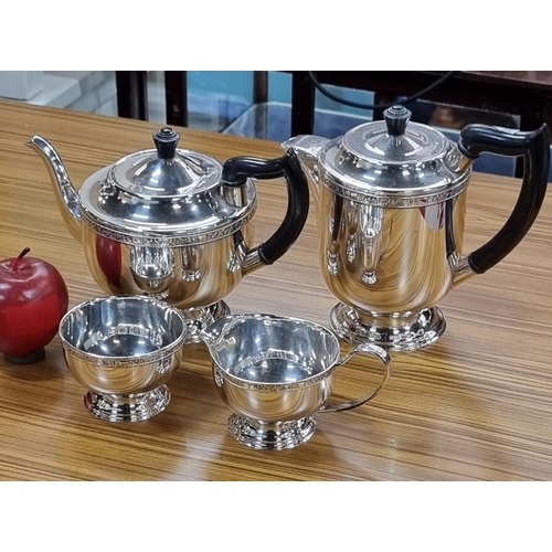 422 - A four-piece Viners of Sheffield silver plated tea and coffee serving set, with cream jug and sugar ... 