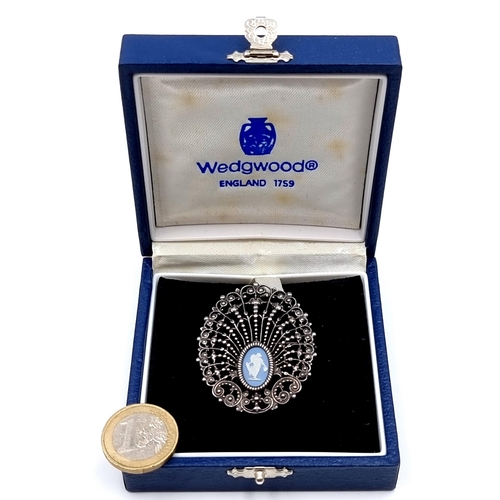 A beautiful vintage original Wedgewood Peacock design brooch, set in sterling silver and presented in its original Wedgewood gift box. Weight: 9 grams.