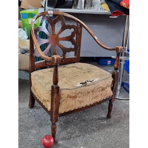 647 - A great Victorian example of a nursing chair with a floral, pierced splat back and original upholste... 