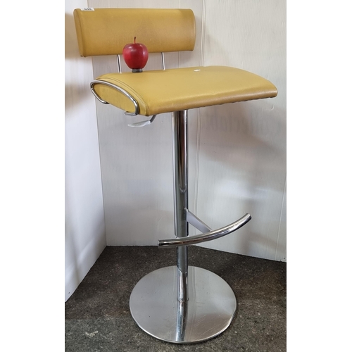 648 - A stunning example of a Fram Stile Italiano adjustable chair in a sunflower yellow upholstery, and w... 