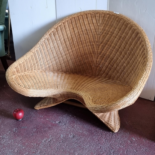 676 - A mid century bamboo and rattan meditation chair by Bo & Manaka. In good condition. Fabulous shape t... 