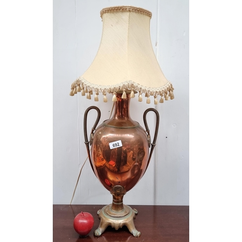 692 - A very large Victorian unique urn shaped, copper and brass lamp with twin handles and lovely verdigr... 