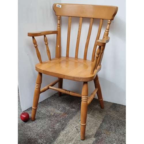 698 - A charming farmhouse kitchen table with tiled top, along with four spindle-back chairs.