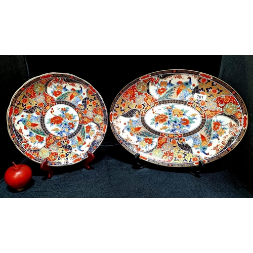 701 - Two beautiful pieces of  Japanese porcelain in the Imari style including a circular and ovular examp... 