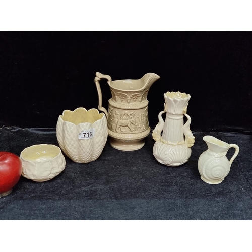 716 - Five ceramic items including four beautiful examples of Belleek porcelain and a Victoria water jug i... 