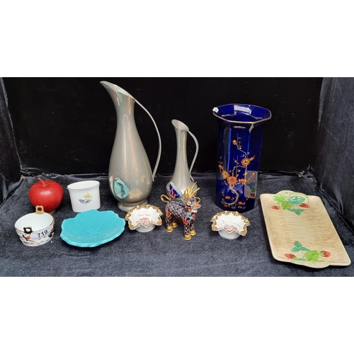 719 - A selection of ten collectible ceramic items, including an antique cake tray by Beswick, and a Royal... 