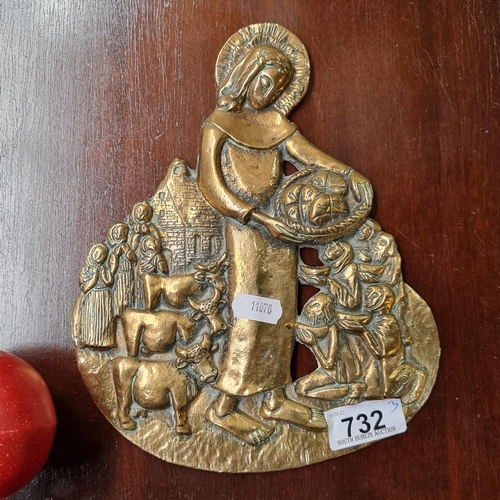 732 - Star Lot: A fabulous polished bronze relief plaque depicting 'Saint Brigid Feeding the Poor' by arti... 