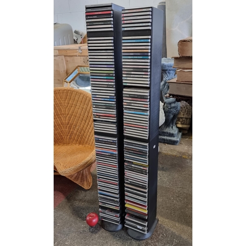 752 - Two tall standing CD holders made by Case Logic with space for 85 CD's each, that's space for 170 CD... 