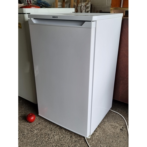 757 - A Beko refrigerator. Model UL483APW. In good clean condition.