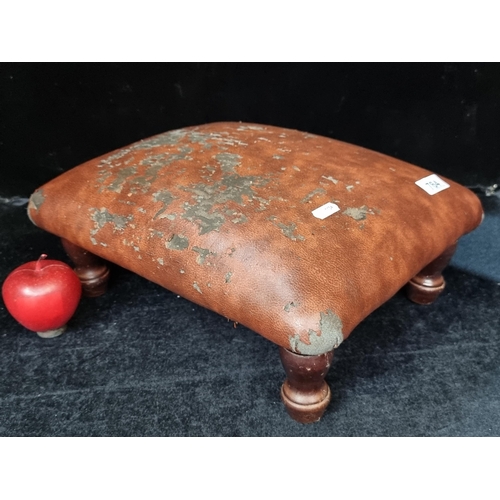 764 - A very charming Victorian footstool, with turned legs and a soft leather top. Leather top needs some... 