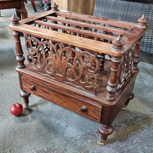 778 - A charming Victorian canterbury/magazine stand with profuse pierced ornament and a single drawer, he... 