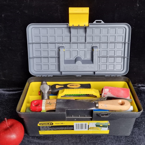 794 - A Stanley hard case tool box with handle to top and pleanty of storage space inside. Comes with a nu... 