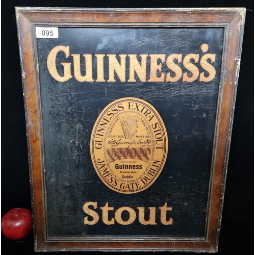 95 - A print of an advertisement for Guinness Extra Stout.