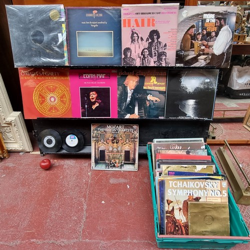 765 - A large crate containing a large quantity of vinyl albums and records. Including an original 1983 do... 