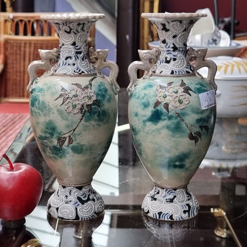 430 - A stunning pair of highly unusual Japanese stoneware vases from the Meiji era. This expertly crafted... 