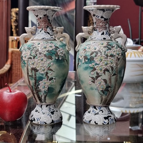 430 - A stunning pair of highly unusual Japanese stoneware vases from the Meiji era. This expertly crafted... 