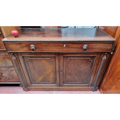 271 - Star Lot : A large Georgian mahogany sideboard with rope twist columns and border. Featuring a singl... 