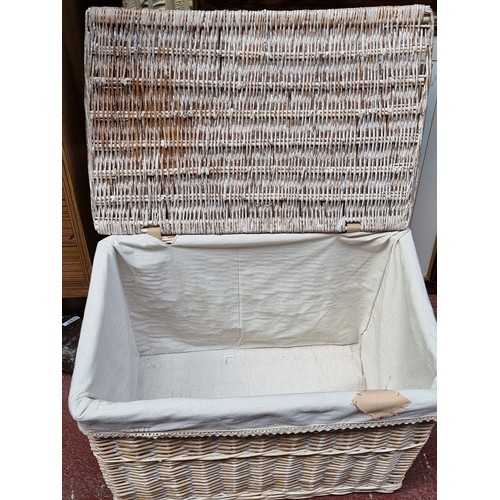 333 - A charming example of a laundry hamper with linen lining and large bunny rabbit decoration in clean ... 