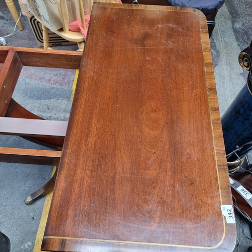 342 - Star Lot : A lovely antique-style folding table with lion paw feet and casters, brass toned hardware... 