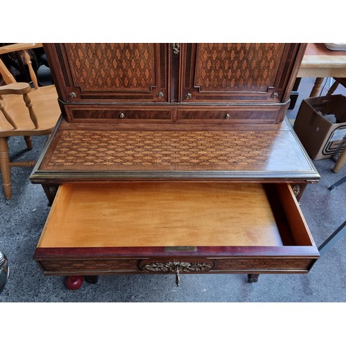 371 - Star Lot : An antique French gorgeous writing desk, with two doors to reveal shelves, and two pull-o... 