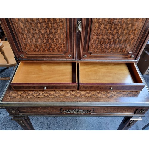 371 - Star Lot : An antique French gorgeous writing desk, with two doors to reveal shelves, and two pull-o... 