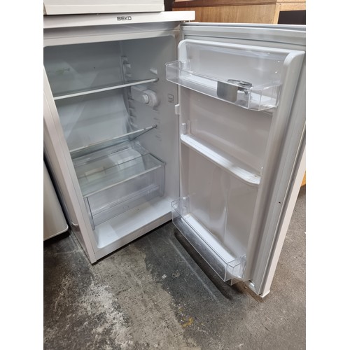 757 - A Beko refrigerator. Model UL483APW. In good clean condition.