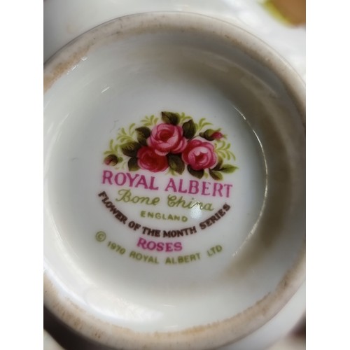 725 - A collection of nineteen Royal Albert bone china tea set, dated 1969. Features the Celebrations and ... 