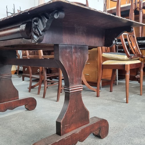 671 - An elegant Victorian console table with carved border, two drawers to the front, and a stretcher bet... 