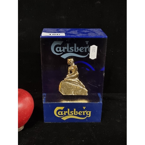 186 - A heavy electric Carlsberg advertising light box with a gilt figure of the little mermaid sculpture ... 