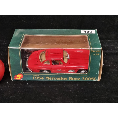 198 - A highly collectible Superior brand 1954 Mercedes Benz 300SL model car in red, with original packagi... 