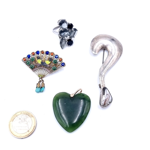 26 - A collection of vintage items, including a polished jade heart pendant (cold to touch), an inlayed s... 