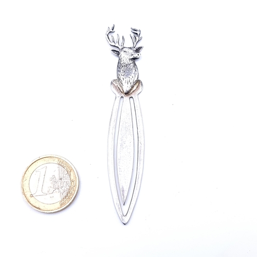 28 - A very nice example of a sterling silver page marker, which features an attractive stags head finial... 