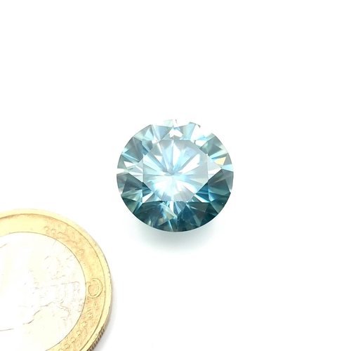 58 - A huge Green Moissanite stone of good size with a weight of 12.18 carats. Comes with a detailed IDT ... 
