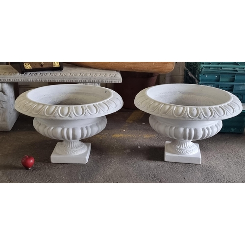 587 - A fabulous pair of heavy fibreglass wide planters in a Neoclassical style. In a white finish.