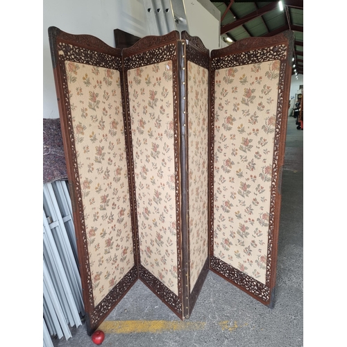 595 - Star Lot : A gorgeous Victorian four-panel screen, featuring relief carved wooden border with floral... 