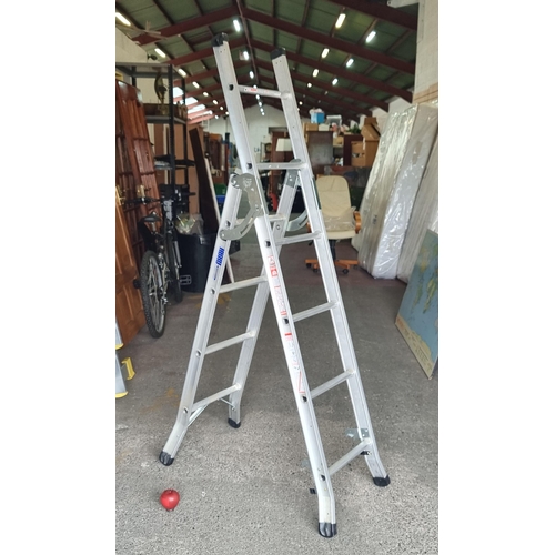 597 - An Abru Ltd. adjustable height ladder with ten steps.