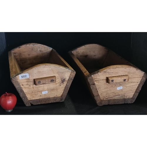 602 - A pair of antique garden planters, with handles and metal banding. Maybe originally for making bread... 